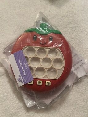 Red Smiley Tomato Popper Sensory Toy for Kids